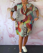 Ria - Vestido colorido con cuello en V