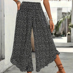 Adela - Pantalón fluido de lunares con volante