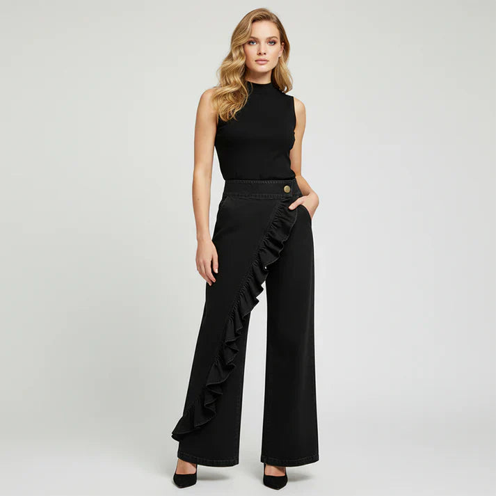 Violeta - Pantalones vaqueros asimétricos con volante y pierna ancha