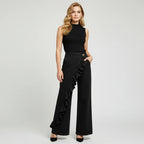 Violeta - Pantalones vaqueros asimétricos con volante y pierna ancha